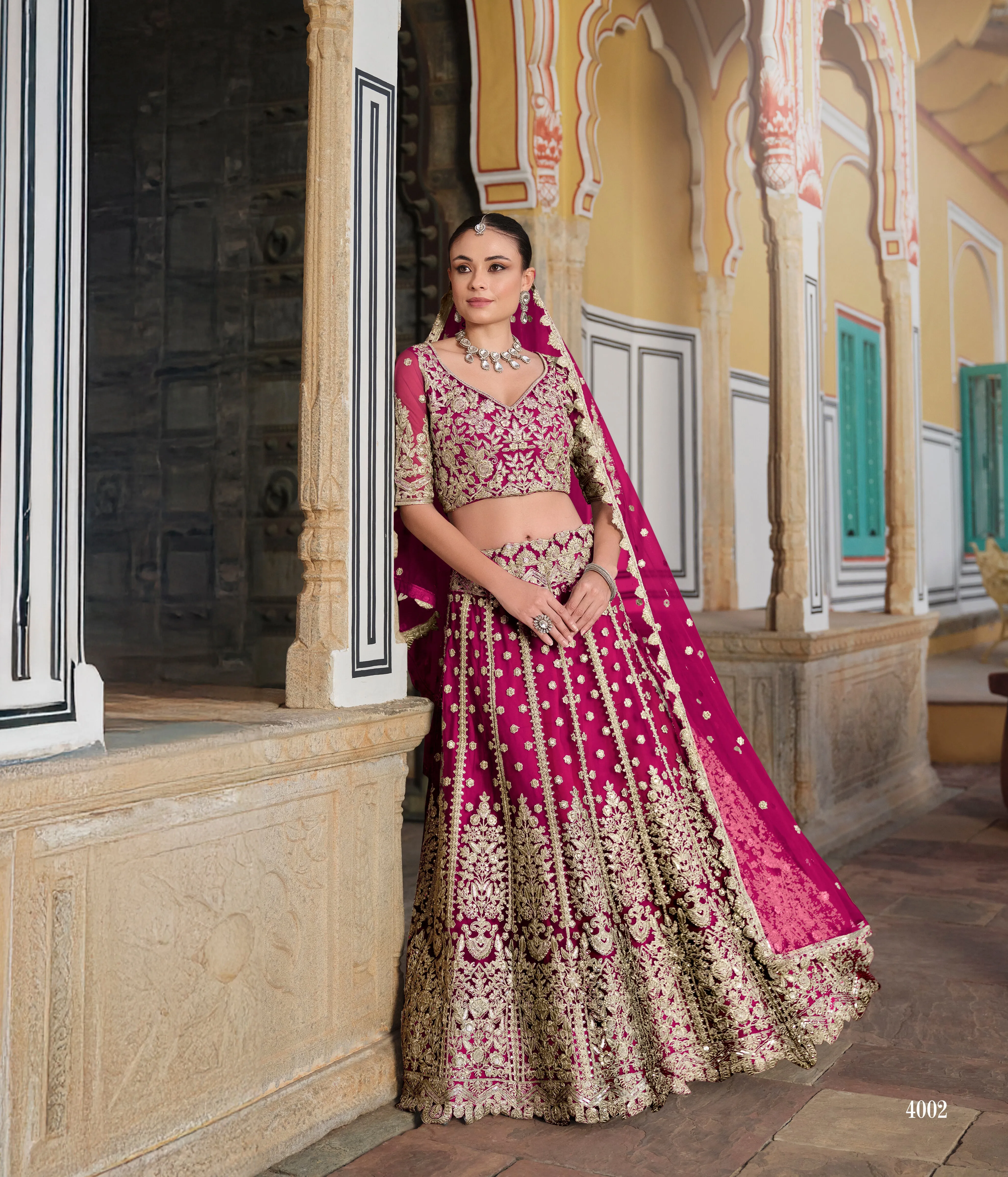 Pink Heavy Embroidered Net Bridal Lehenga Choli